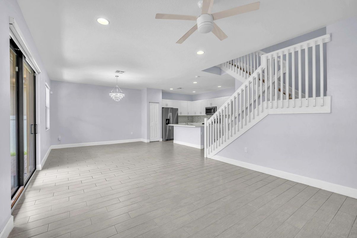 Chandelier, Empty room, Interior, Kitchen, Recessed Lighting, Stainless Steel Appliances, Wood Texture Flooring