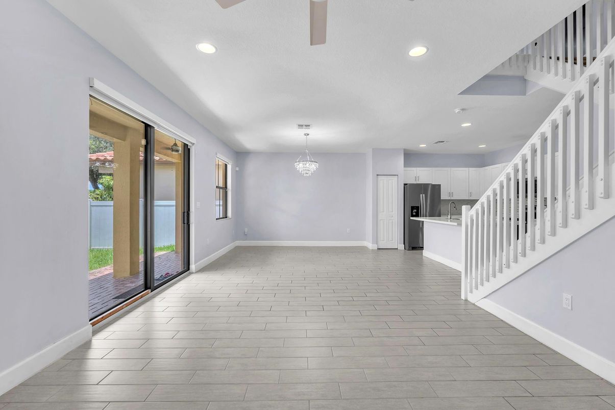 Chandelier, Empty room, Interior, Kitchen, Recessed Lighting, Stainless Steel Appliances, Wood Texture Flooring