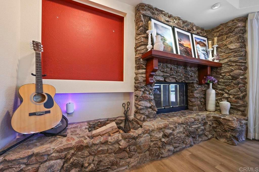 Fireplace, Interior, Recessed Lighting, Stone Walls, Wood Texture Flooring