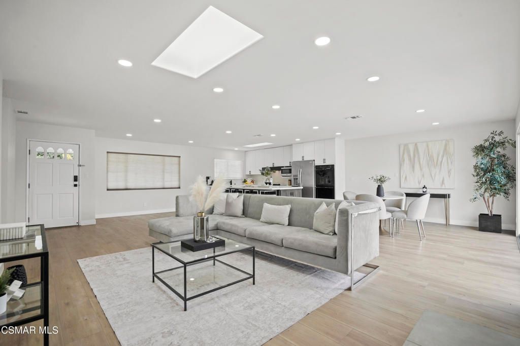 Dining room, Interior, Kitchen, Living room, Recessed Lighting, Stainless Steel Appliances, Wood Texture Flooring
