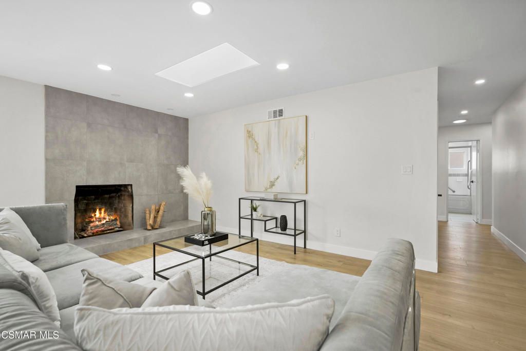 Fireplace, Interior, Living room, Recessed Lighting, Wood Texture Flooring