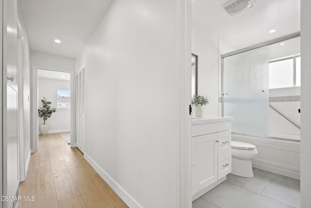 Bathroom, Glass Shower, Interior, Recessed Lighting, Wood Texture Flooring