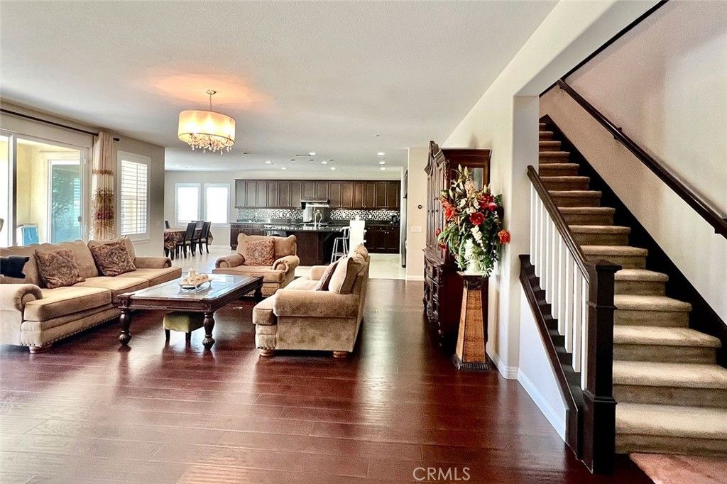Chandelier, Dining room, Interior, Kitchen, Living room, Recessed Lighting, Stainless Steel Appliances, Wood Texture Flooring