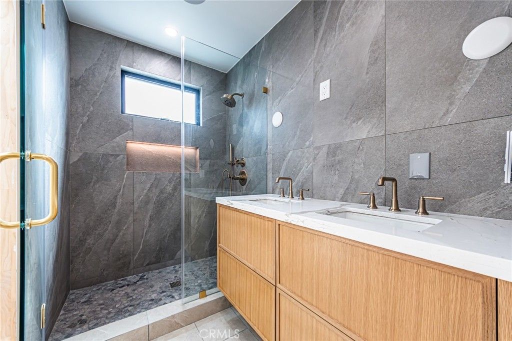 Bathroom, Dual Sink Vanities, Glass Shower, Interior, Marble Walls, Recessed Lighting