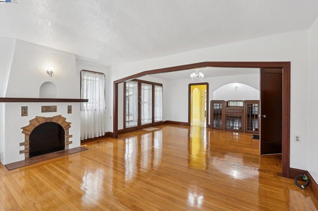 Chandelier, Empty room, Fireplace, Interior, Wood Texture Flooring