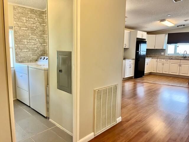 Interior, Kitchen, Stone Walls, Washer, Wood Texture Flooring