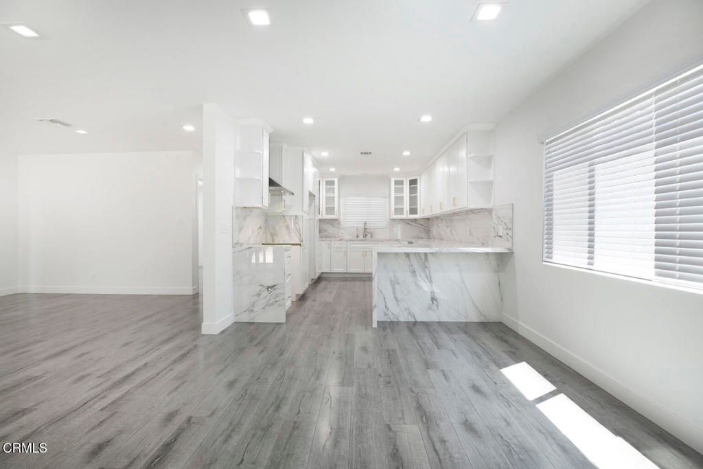 Interior, Kitchen, Marble Walls, Recessed Lighting, Wood Texture Flooring