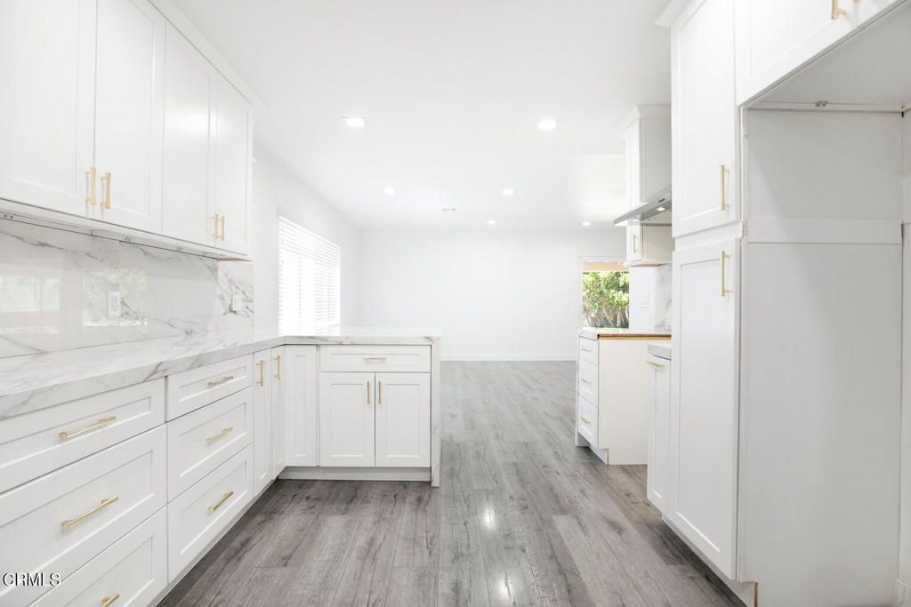Interior, Kitchen, Marble Walls, Recessed Lighting, Wood Texture Flooring
