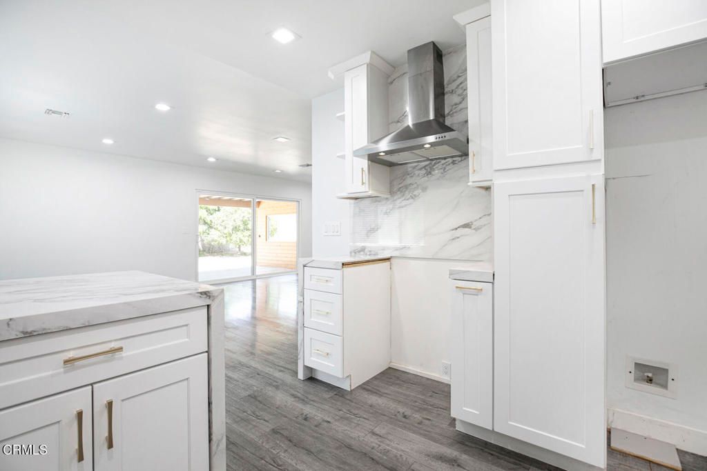 Interior, Kitchen, Marble Walls, Recessed Lighting, Wood Texture Flooring