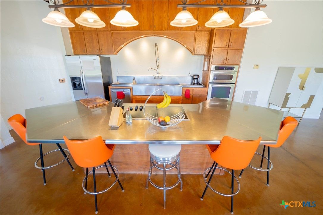 Dining room, Interior, Kitchen, Pendant Lights, Stainless Steel Appliances
