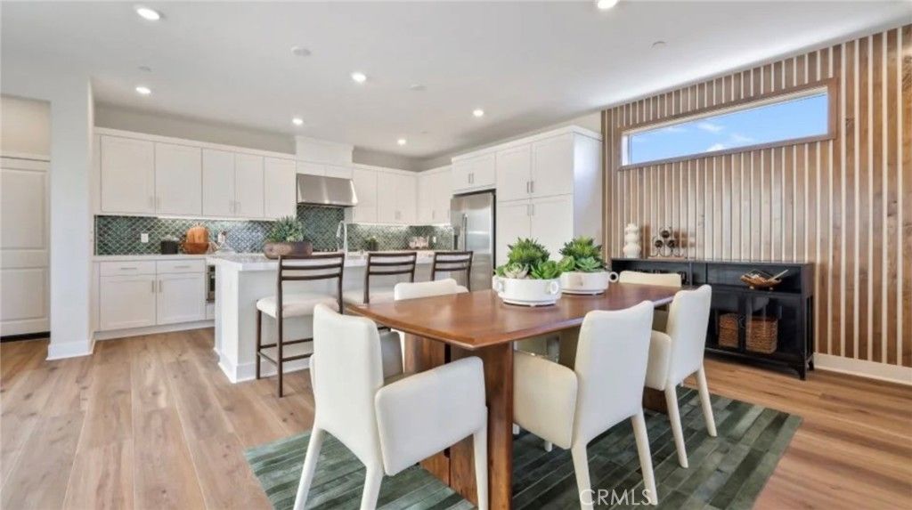 Dining room, Interior, Kitchen, Recessed Lighting, Stainless Steel Appliances, Wood Texture Flooring