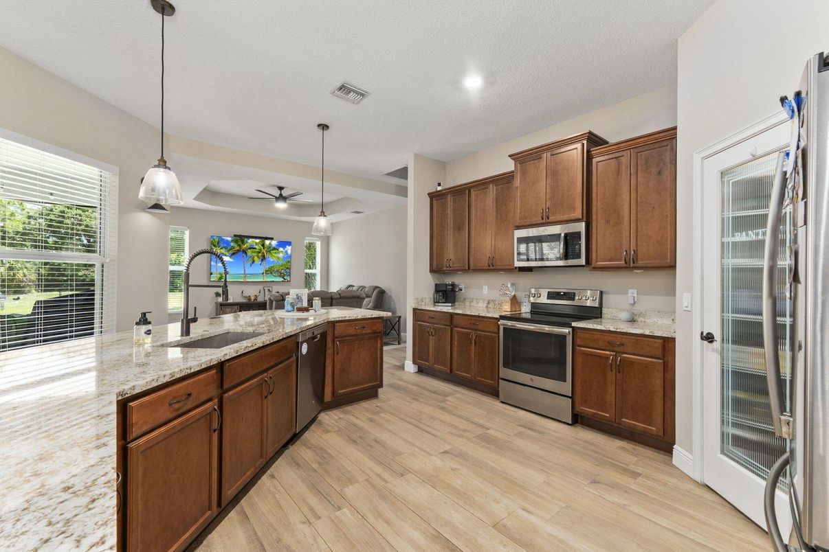 Interior, Kitchen, Pendant Lights, Recessed Lighting, Stainless Steel Appliances, Wood Texture Flooring