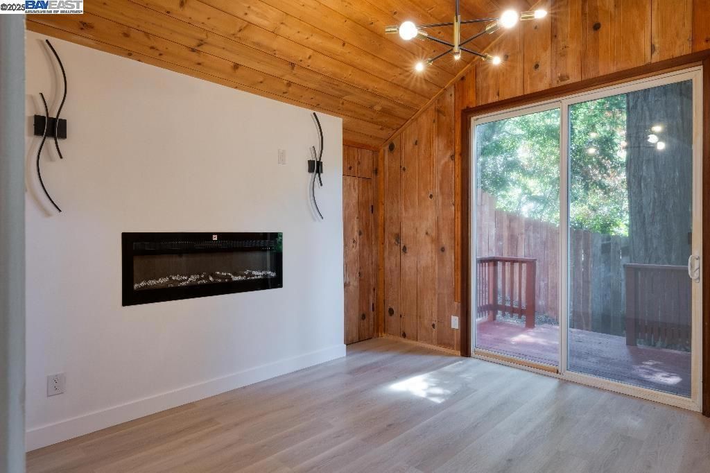 Empty room, Fireplace, Interior, Pendant Lights, Wooden Ceilings, Wood Texture Flooring, Wooden Walls