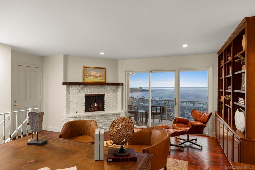 Fireplace, Interior, Recessed Lighting, Stone Walls, Water, Wood Texture Flooring