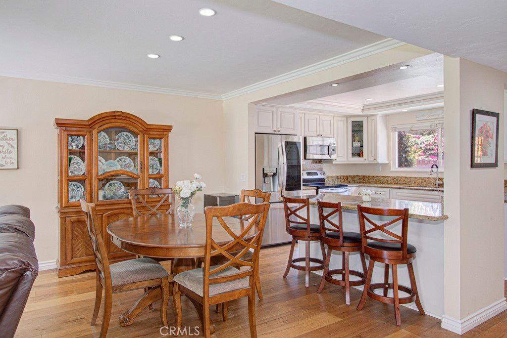 Dining room, Interior, Kitchen, Recessed Lighting, Stainless Steel Appliances, Wood Texture Flooring