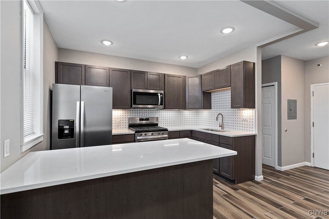 Interior, Kitchen, Recessed Lighting, Stainless Steel Appliances, Wood Texture Flooring
