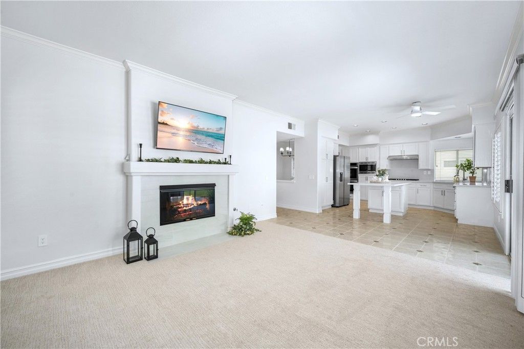 Empty room, Fireplace, Interior, Kitchen, Recessed Lighting, Stainless Steel Appliances