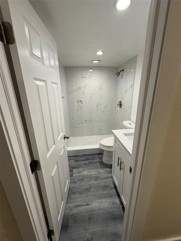 Bathroom, Interior, Marble Walls, Recessed Lighting, Wood Texture Flooring
