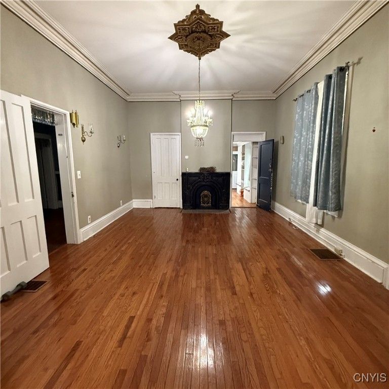 Chandelier, Empty room, Fireplace, Interior, Wood Texture Flooring