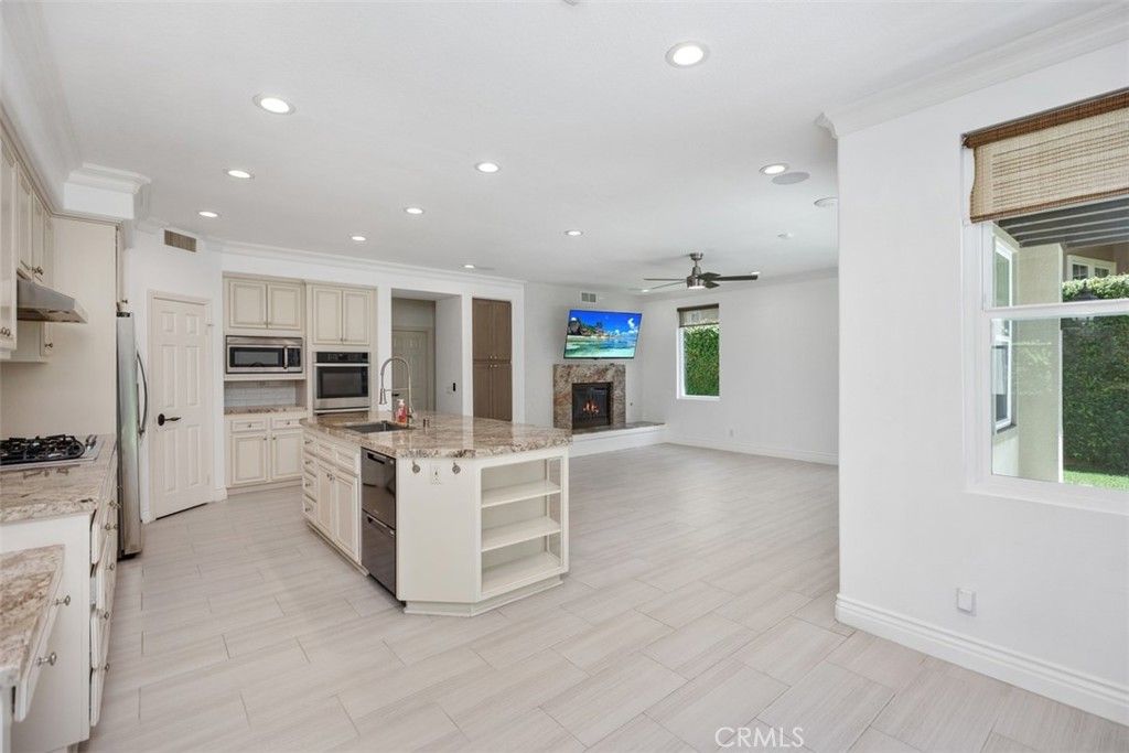 Fireplace, Interior, Kitchen, Recessed Lighting, Stainless Steel Appliances