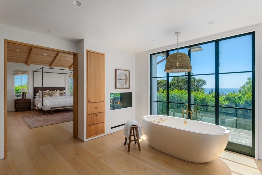 Bathroom, Bedroom, Free Standing Baths, Interior, Pendant Lights, Recessed Lighting, Water, Wooden Ceilings, Wood Texture Flooring