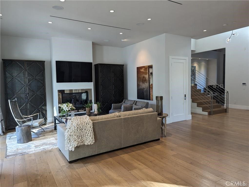Fireplace, Interior, Living room, Recessed Lighting, Wood Texture Flooring