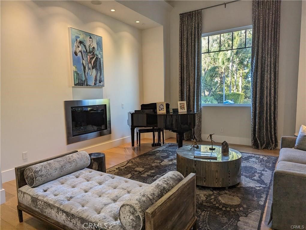 Fireplace, Interior, Living room, Piano, Recessed Lighting, Wood Texture Flooring
