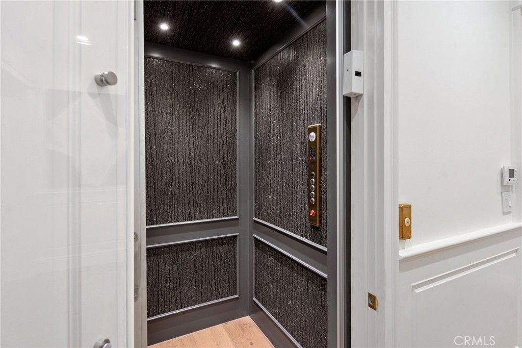 Elevator, Interior, Recessed Lighting, Wood Texture Flooring, Wooden Walls