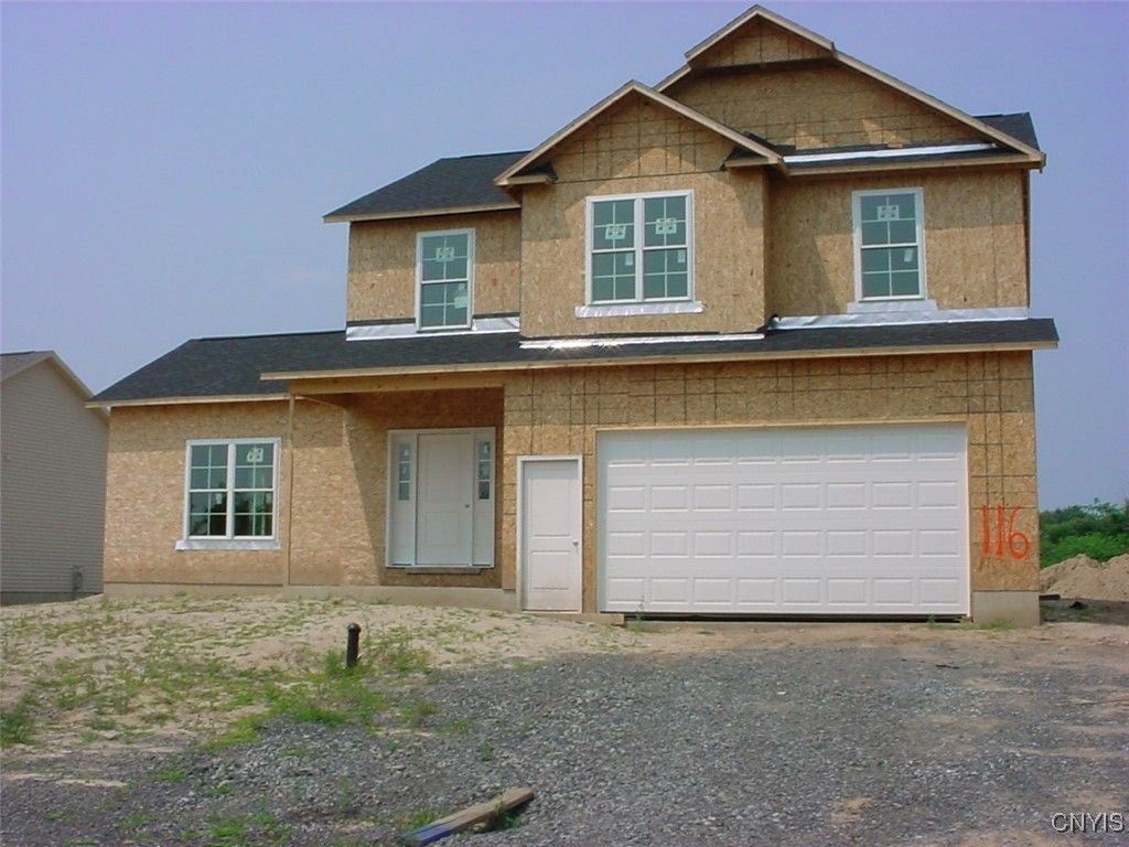 Attached, Exterior, Facade, Brick Traditional