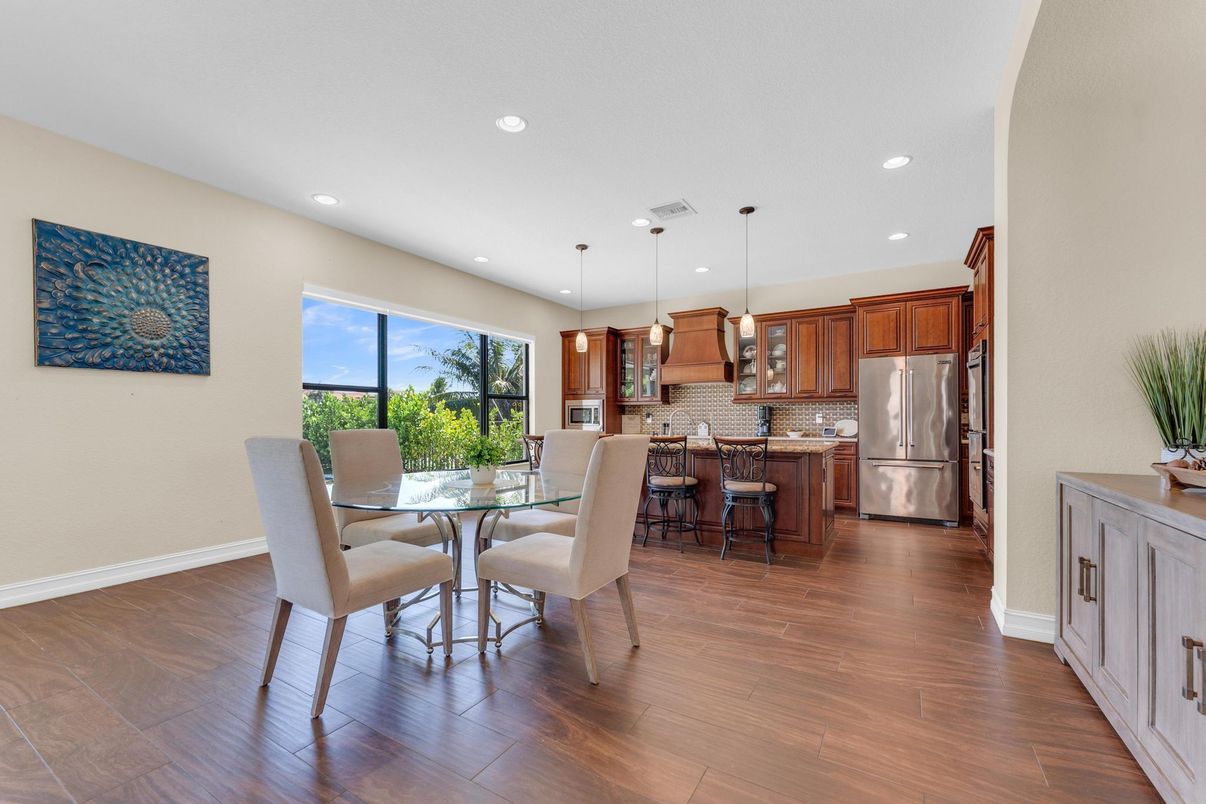 Dining room, Interior, Kitchen, Pendant Lights, Recessed Lighting, Stainless Steel Appliances, Wood Texture Flooring