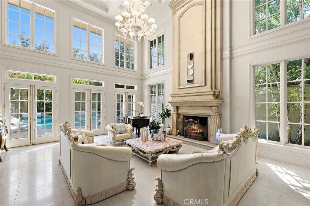 Chandelier, Fireplace, Interior, Living room, Piano, Sun Room