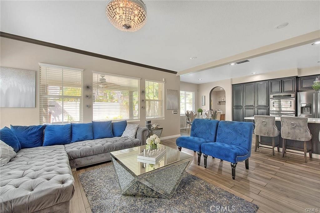 Dining room, Interior, Kitchen, Living room, Recessed Lighting, Stainless Steel Appliances, Wood Texture Flooring
