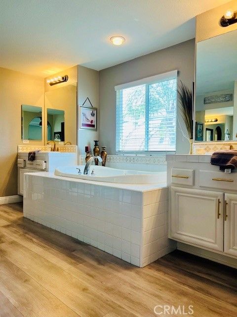 Bathroom, Dual Sink Vanities, Interior, Recessed Lighting, Wood Texture Flooring
