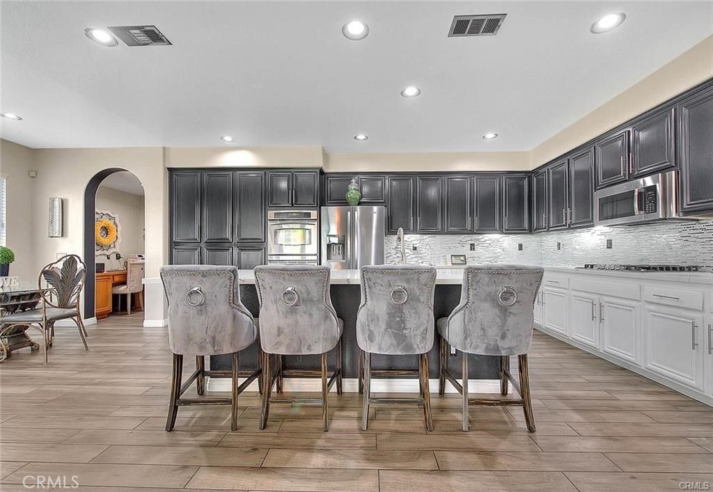 Dining room, Interior, Kitchen, Recessed Lighting, Stainless Steel Appliances, Wood Texture Flooring