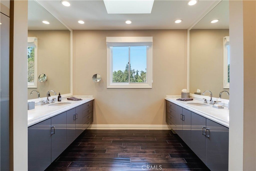 Bathroom, Dual Sink Vanities, Interior, Recessed Lighting, Wood Texture Flooring