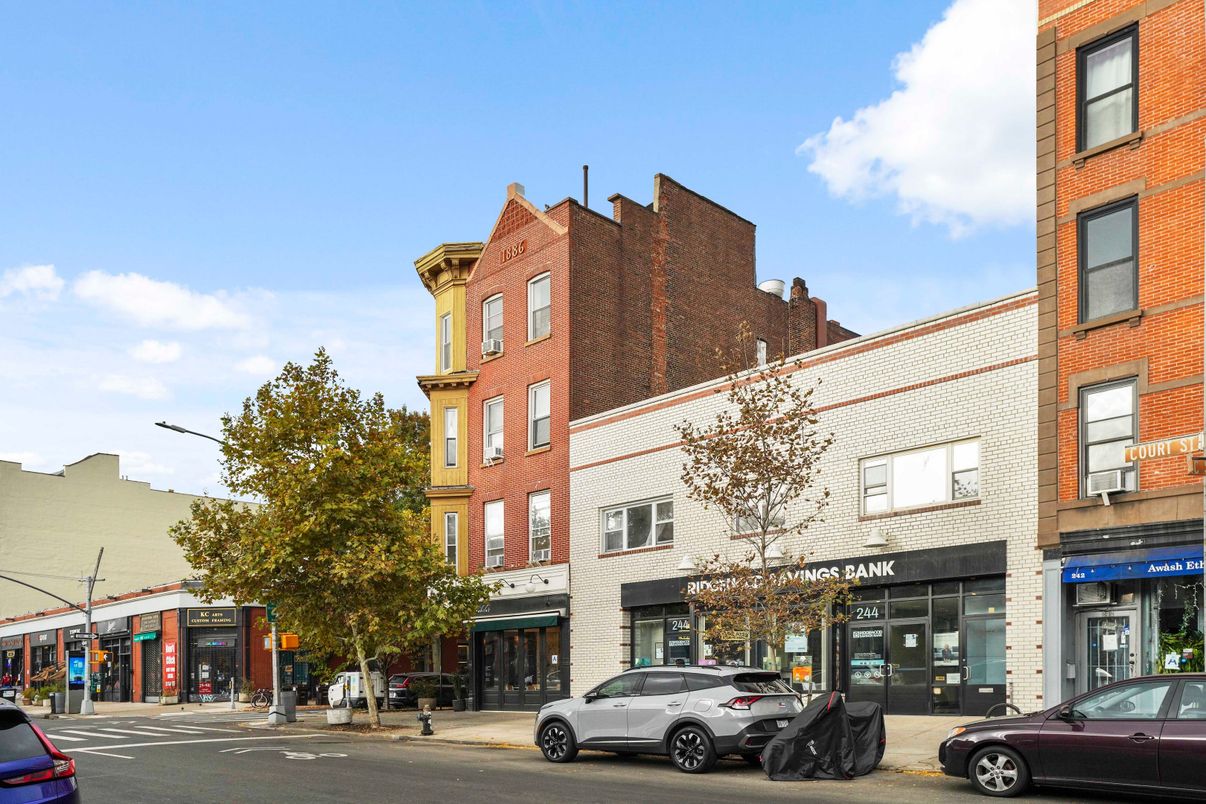 Exterior, Facade, Brick Facade, Condo Building