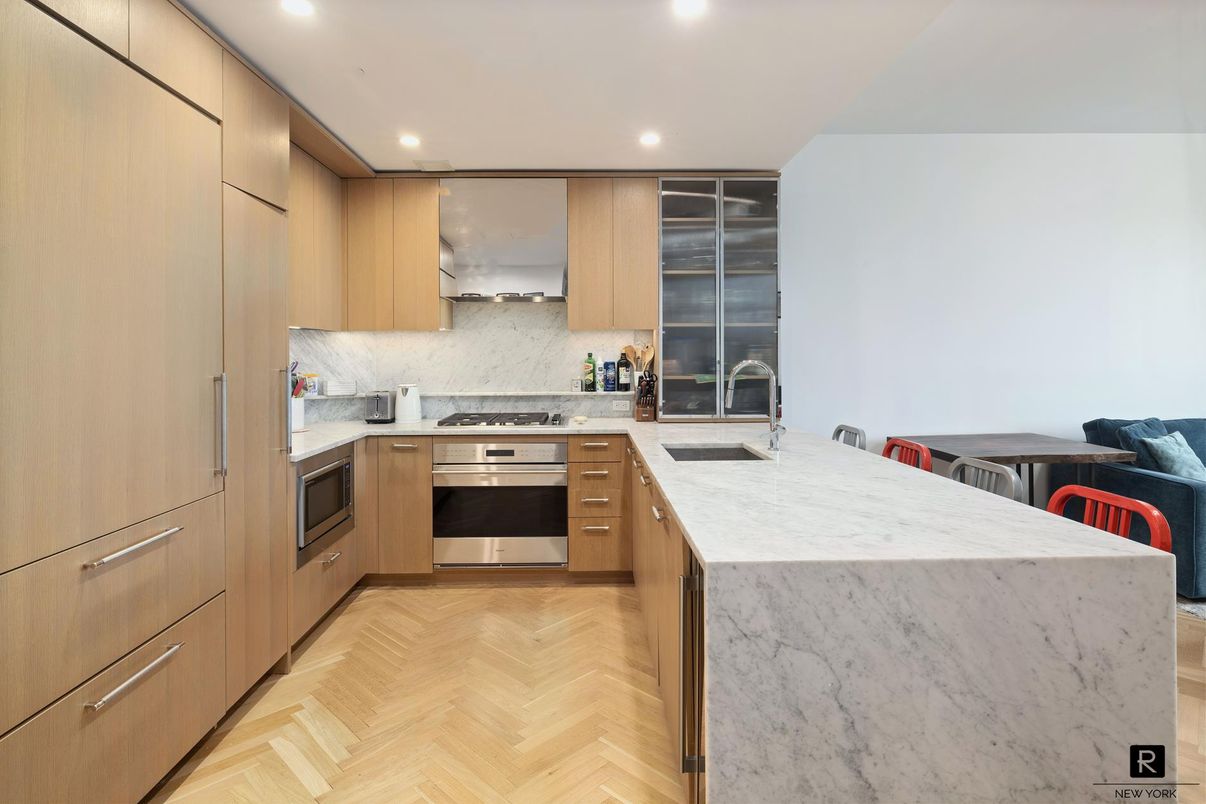 Interior, Kitchen, Marble Walls, Recessed Lighting, Stainless Steel Appliances, Wood Texture Flooring