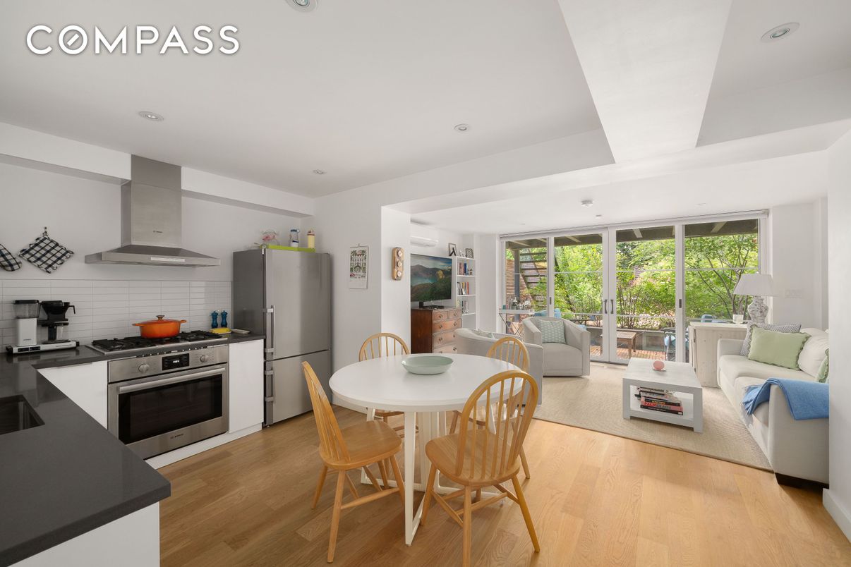 Dining room, Interior, Kitchen, Living room, Recessed Lighting, Stainless Steel Appliances, Wood Texture Flooring