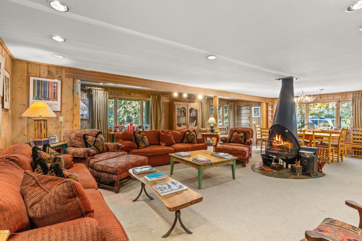 Dining room, Fireplace, Interior, Living room, Recessed Lighting, Wooden Walls