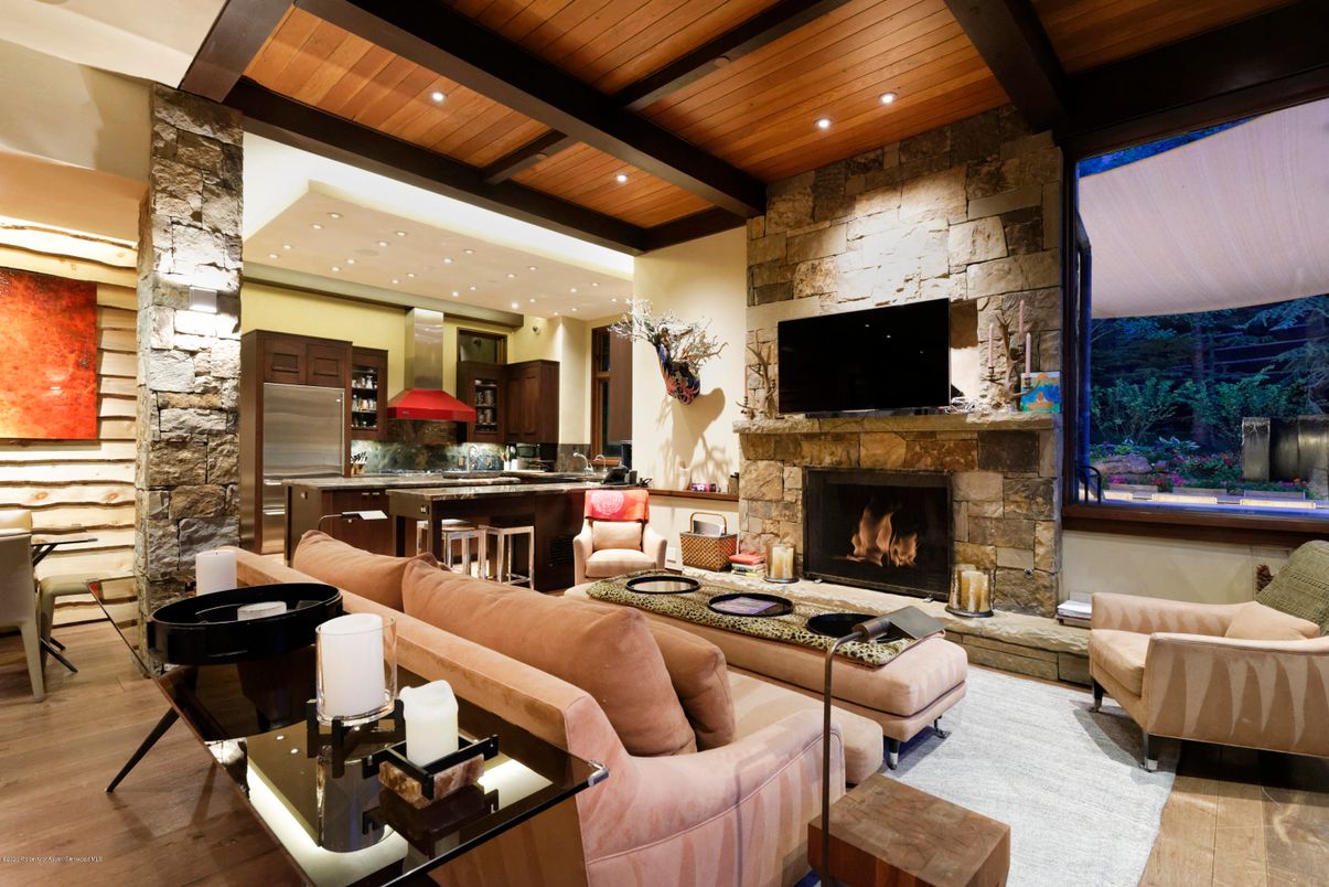 Dining room, Fireplace, Interior, Kitchen, Living room, Recessed Lighting, Stainless Steel Appliances, Stone Walls, Wooden Beams, Wooden Ceilings, Wood Texture Flooring