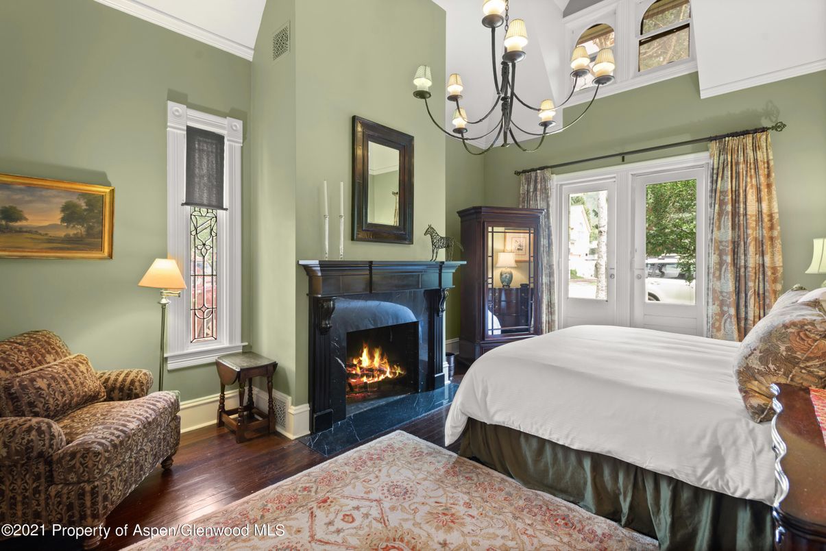 Bedroom, Chandelier, Fireplace, Interior, Wood Texture Flooring