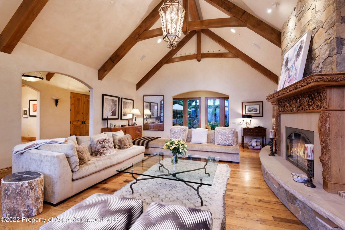 Fireplace, Interior, Living room, Recessed Lighting, Stone Walls, Wooden Beams, Wood Texture Flooring