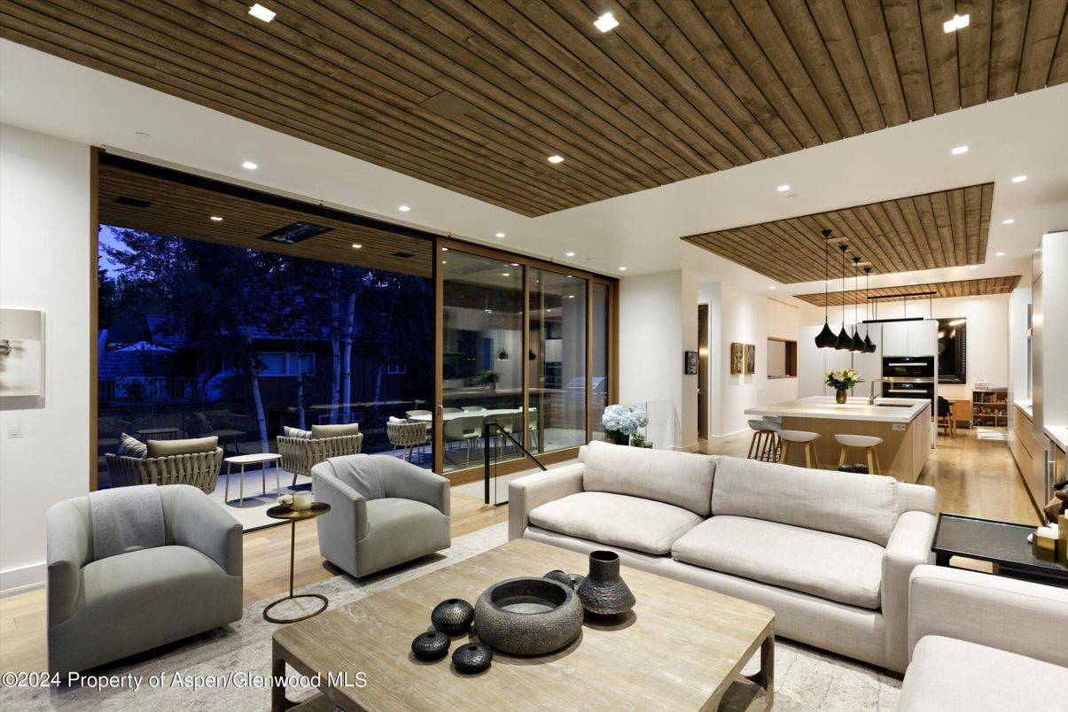 Dining room, Interior, Kitchen, Living room, Pendant Lights, Recessed Lighting, Stainless Steel Appliances, Wooden Ceilings, Wood Texture Flooring