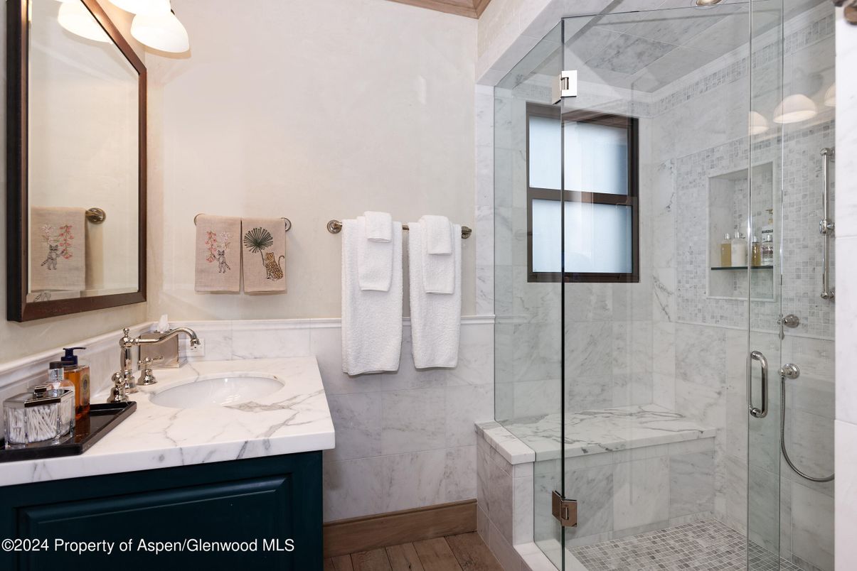 Bathroom, Glass Shower, Interior, Marble Walls, Wood Texture Flooring