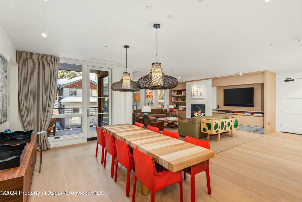 Dining room, Fireplace, Interior, Living room, Pendant Lights, Recessed Lighting, Wood Texture Flooring