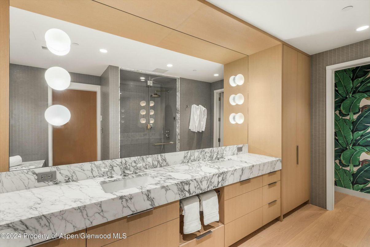 Bathroom, Dual Sink Vanities, Glass Shower, Interior, Recessed Lighting, Wood Texture Flooring