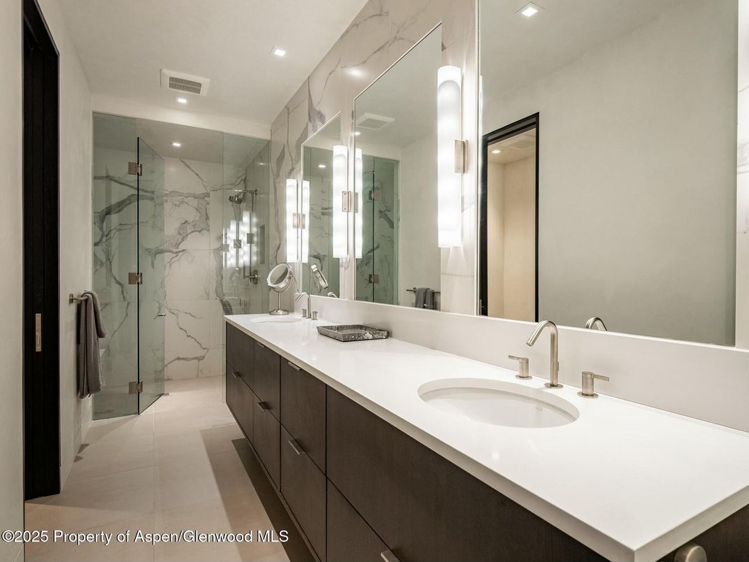 Bathroom, Dual Sink Vanities, Glass Shower, Interior, Marble Walls, Recessed Lighting