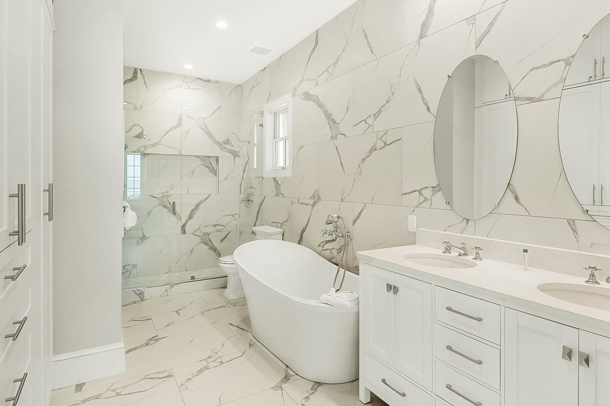 Bathroom, Dual Sink Vanities, Free Standing Baths, Interior, Marble, Marble Walls, Recessed Lighting