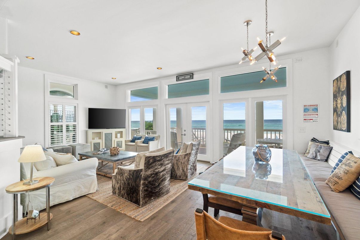 Dining room, Fireplace, Interior, Living room, Pendant Lights, Recessed Lighting, Water, Wood Texture Flooring