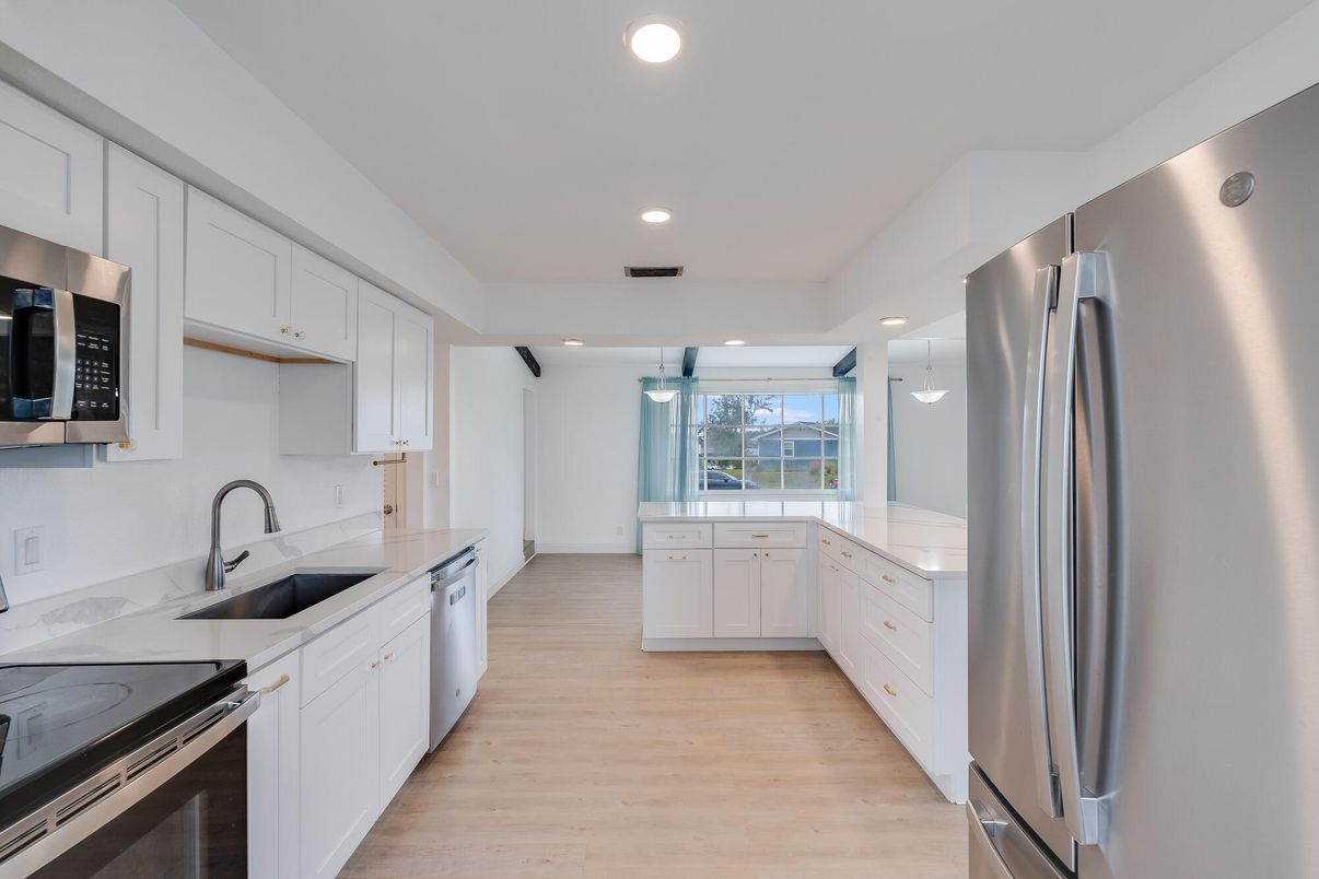 Interior, Kitchen, Recessed Lighting, Stainless Steel Appliances, Wood Texture Flooring